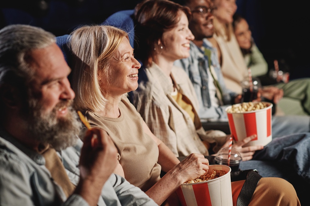 Group Of People Watching Comedy